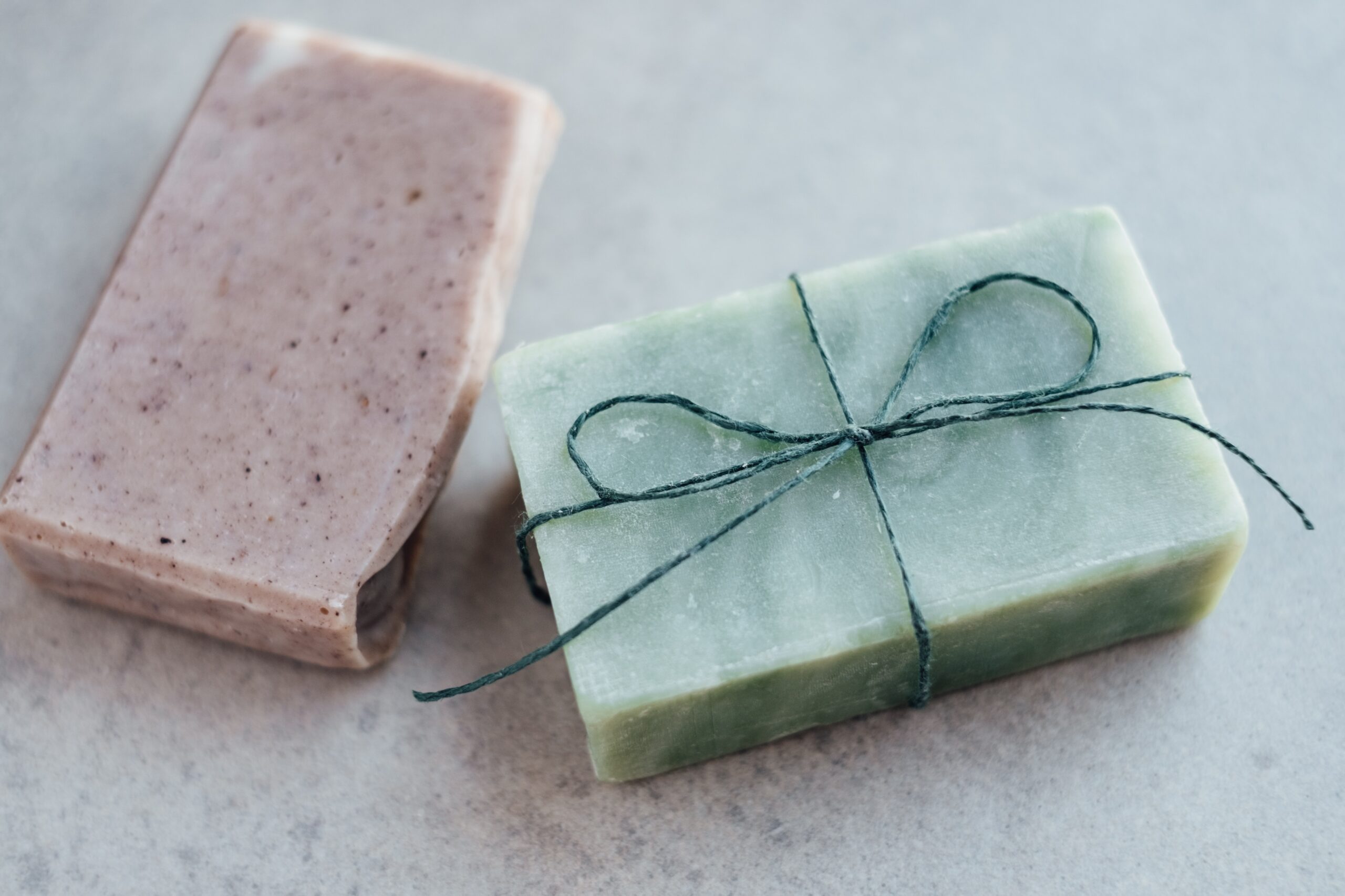 TWO BARS OF SOAP WITH BOW